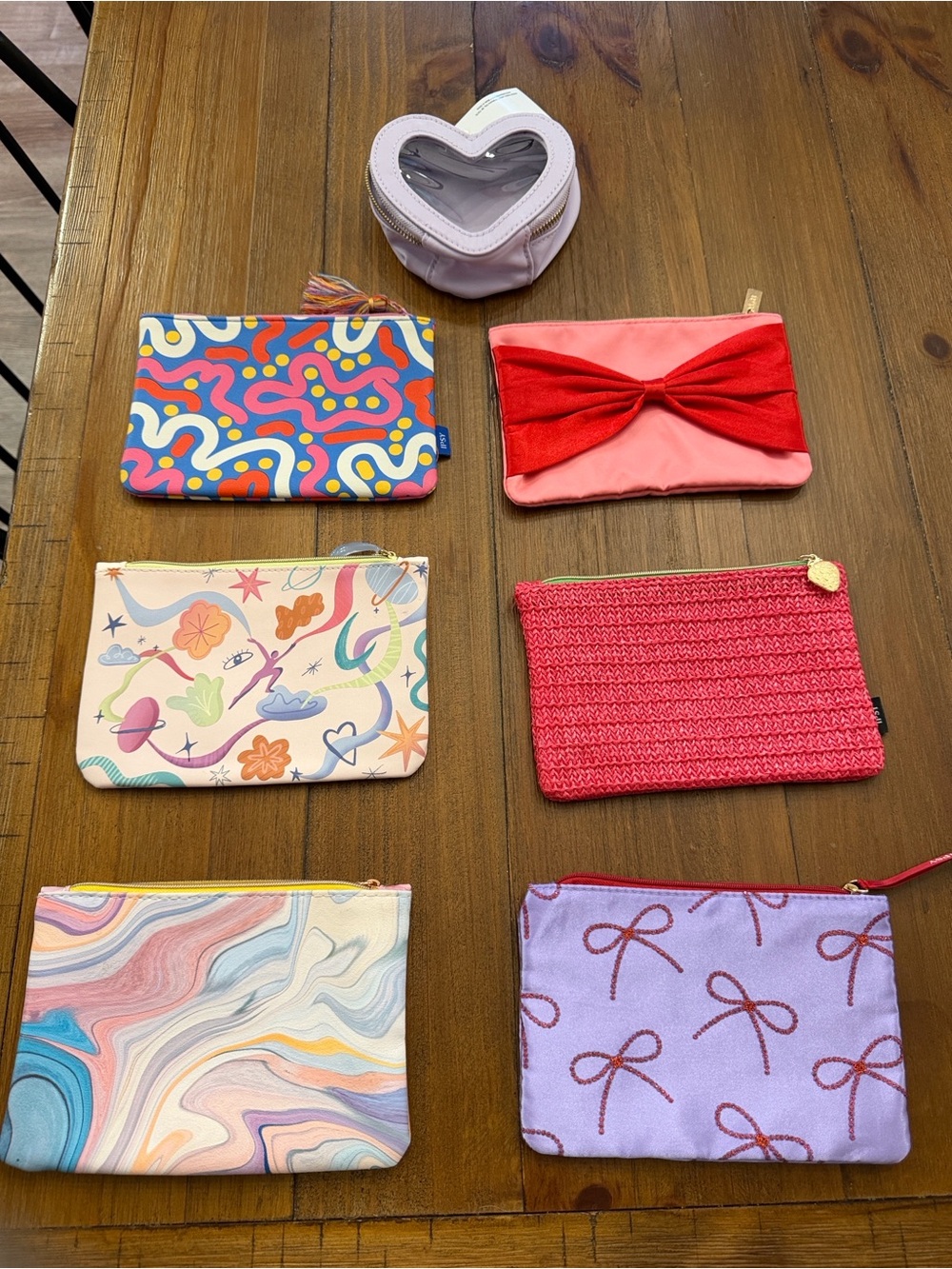 Assorted makeup bags.